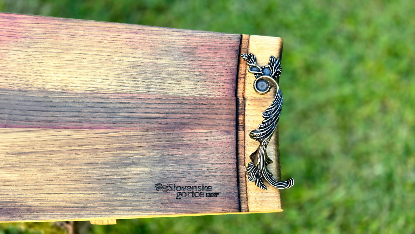 Handmade wooden serving platter showing natural grain and curved design