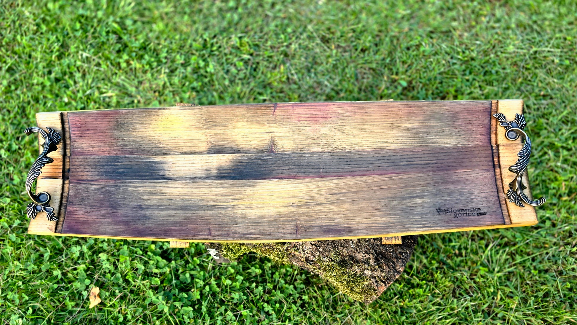 Sustainable reclaimed wood serving board with rich natural wood tones
