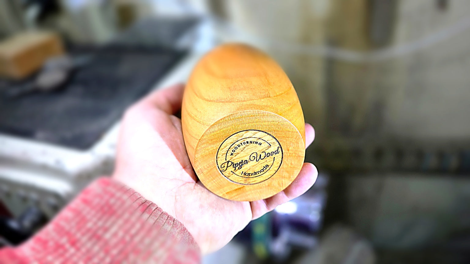 Bottom of cherry wood cup with Pipejawood logo handmade wooden mug