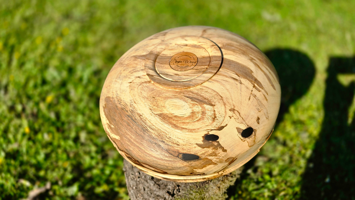 Close-up spalting detail on walnut wood bowl