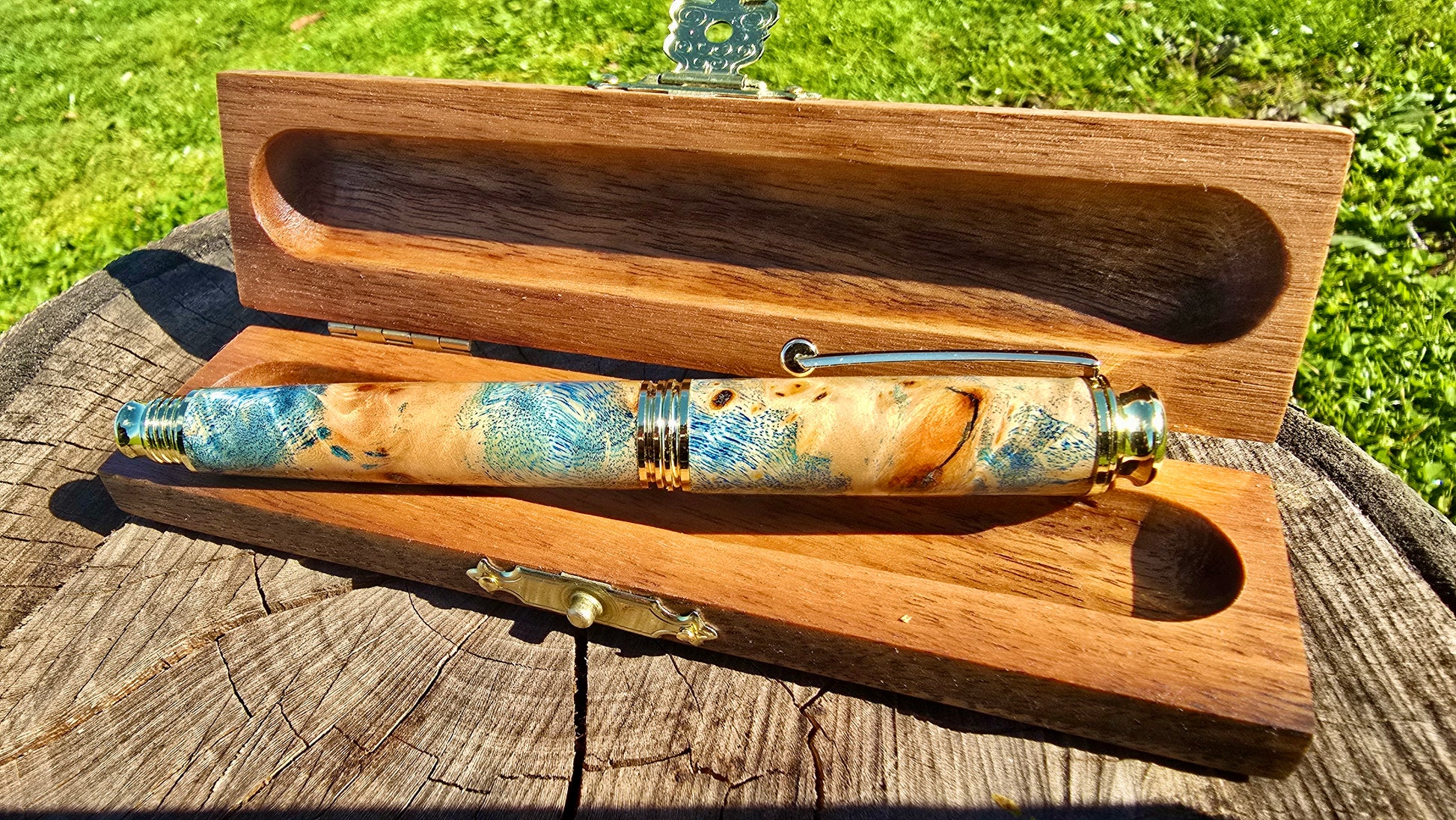 Handcrafted fountain pen and walnut gift box set made from stabilized poplar burl wood and epoxy resin