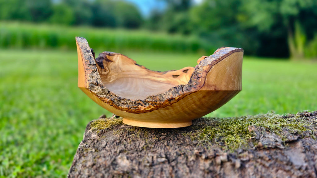 handmade olive wood bowl with bark edge