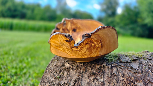 handmade olive wood bowl with bark edge