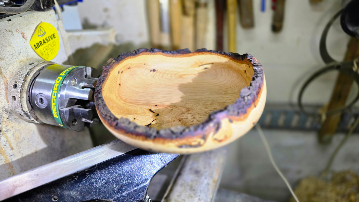 Handmade natural edge oak bowl with bark rim – rustic wooden centerpiece