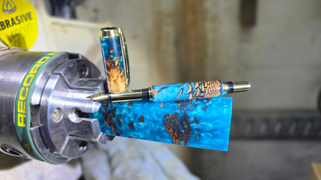 Handcrafted fountain pen from epoxy resin and natural pine cones