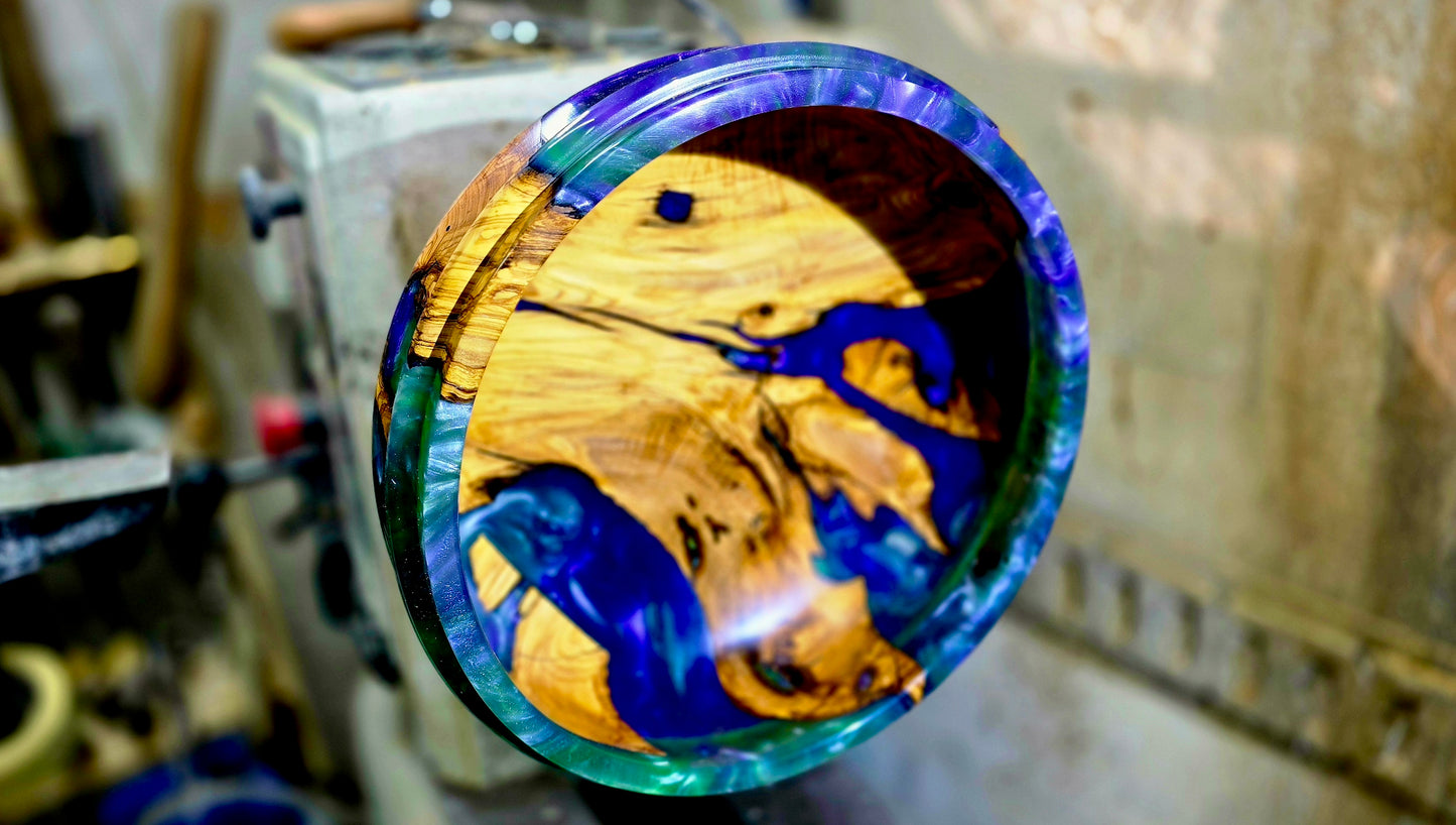 Interior view of handmade olive wood epoxy resin bowl turned from a single unique blank