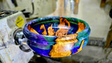 Handmade olive wood and epoxy resin bowl – side view