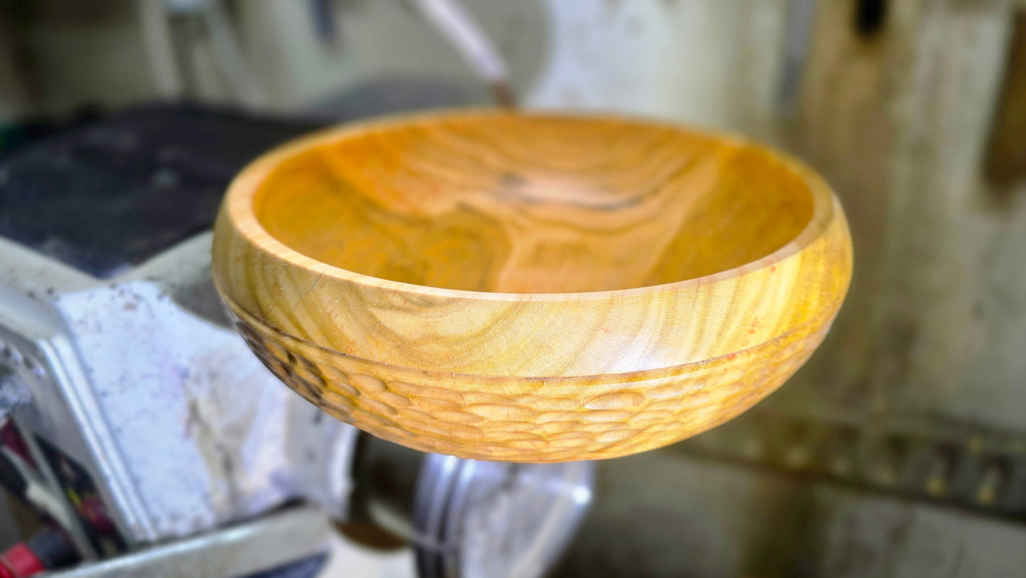 Artisan wood bowl close-up texture and grain detail