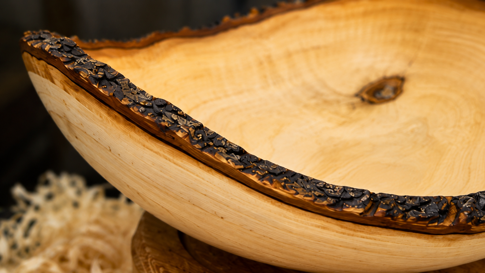 Luxury olive wood bowl with beautiful grain patterns and bark edge