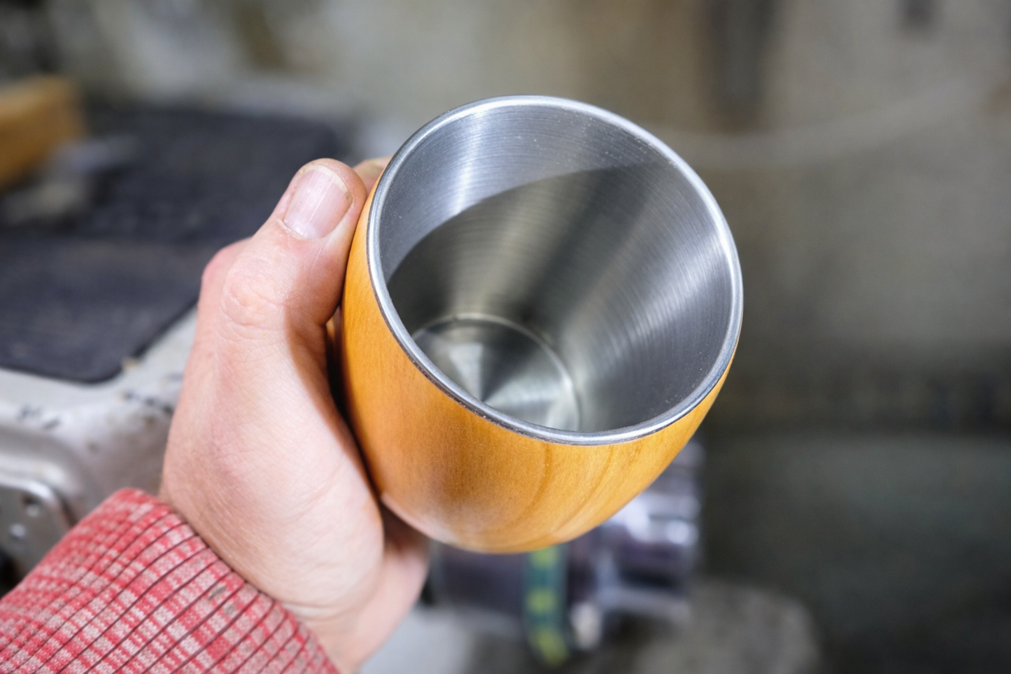 Stainless steel insert inside handcrafted wooden coffee cup for hot drinks