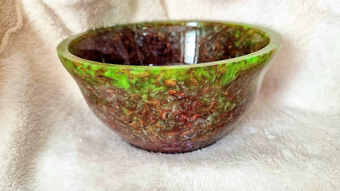 handmade epoxy resin bowl with cherry wood shavings close up