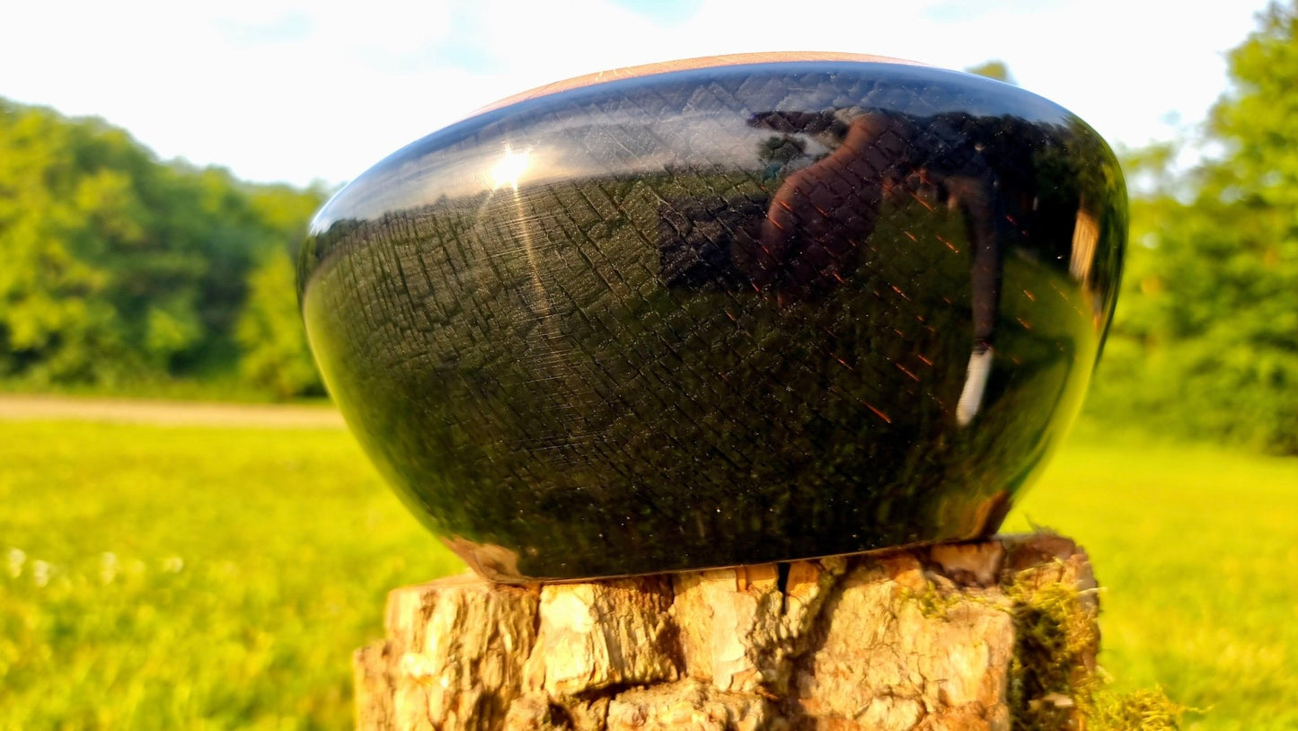 luxury artisan epoxy resin and oak wood bowl displayed outdoors in natural light