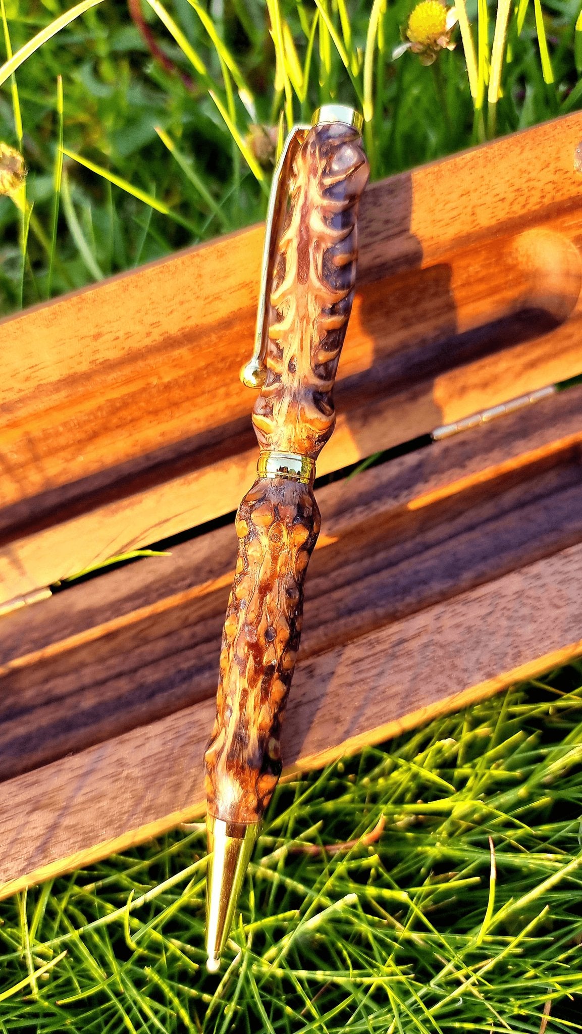 artisan resin pen with real pine cones close-up detail