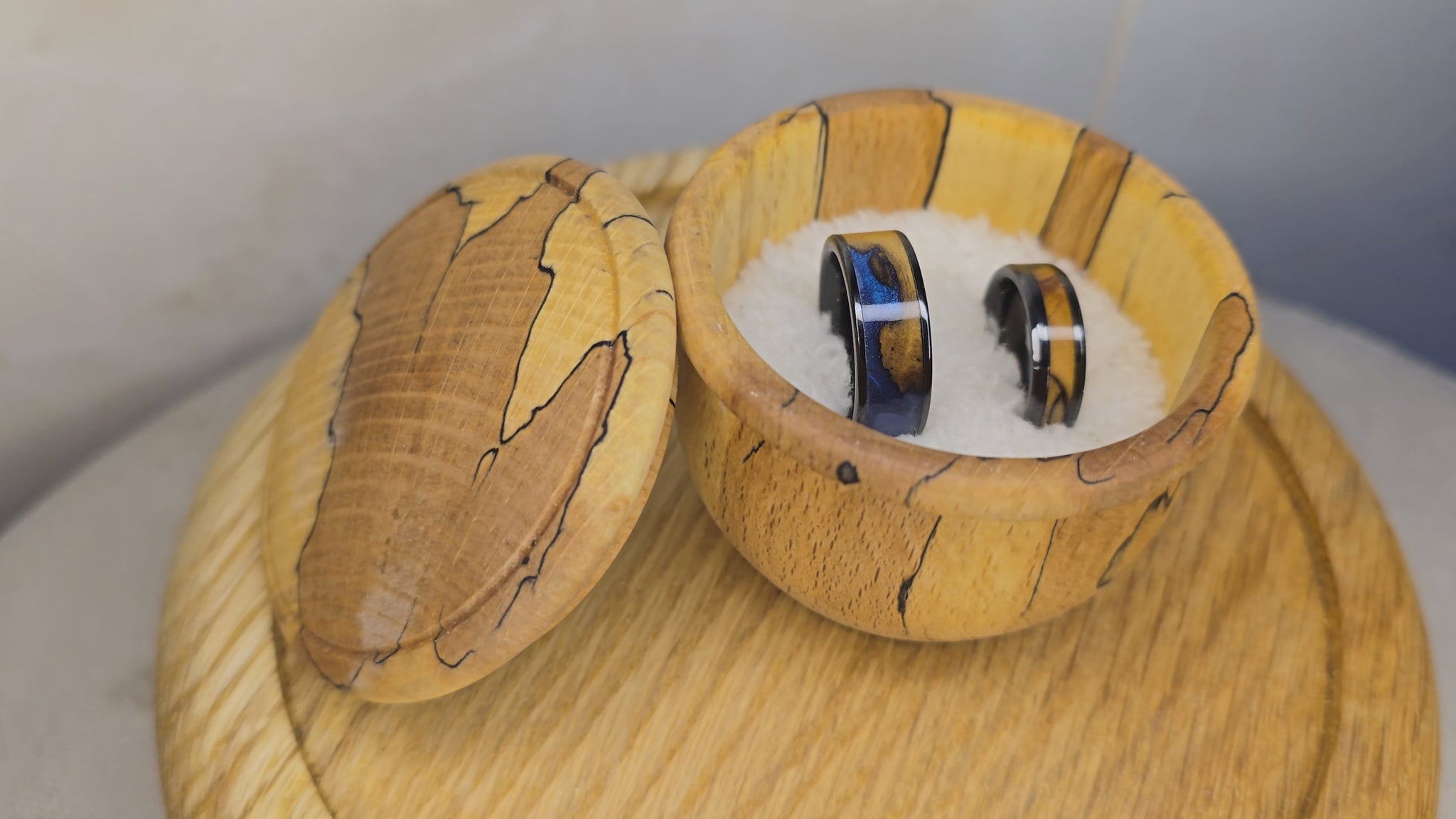 olive wood wedding ring In a box